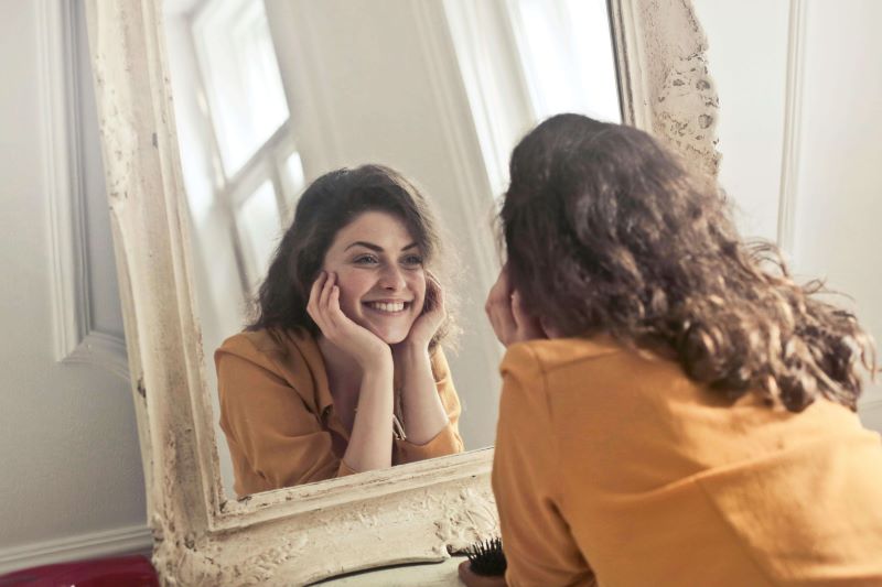 lady looking in mirror